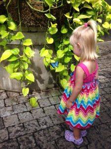 Little girl with butterfly