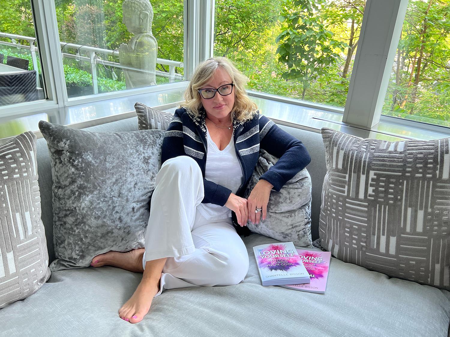 Shantelle-Bisson sitting on couch