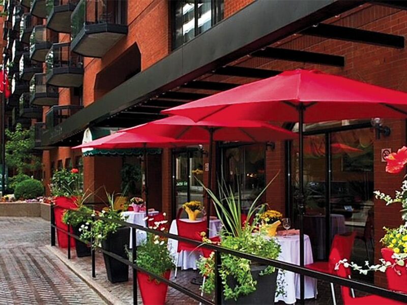 Patio pic with Cda flag in background May 2026 low res