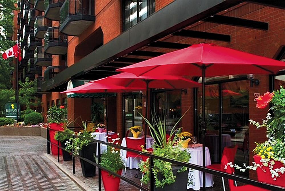 Patio pic with Cda flag in background May 2026 low res