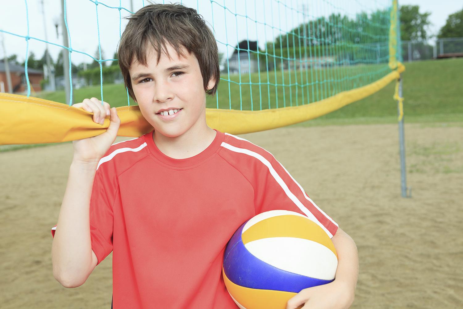 iStock boy with ball at beachLarge[20]