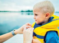 little boy with a floating vest