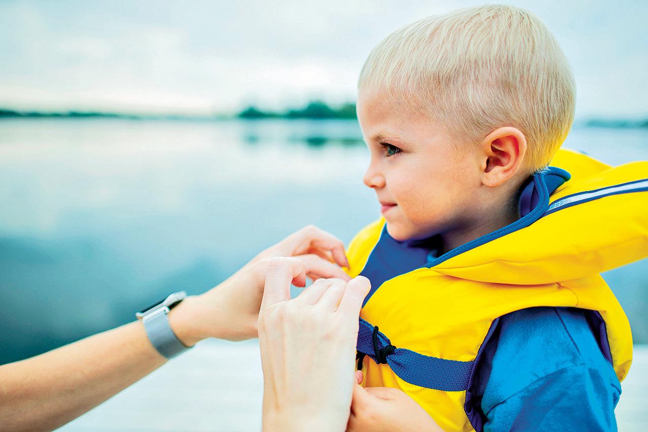 little boy with a floating vest